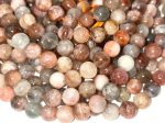 AAA Natural  Silver sunstone bead. 6mm,8mm,10mm round smooth Gorgeous natural silver, dusty rose color . Stunning looking bead! Fashion